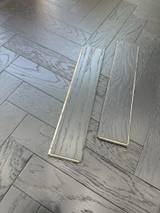 10mm Engineered Wood Herringbone Tongue & Groove Galaxy Black Brushed Lacquered / Lac 10mm Herringbone Narrow Planks Mid Oak Light - Image 1